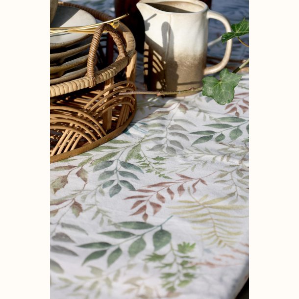 detalje af dug i bomuld med gr�nt bladm�nster