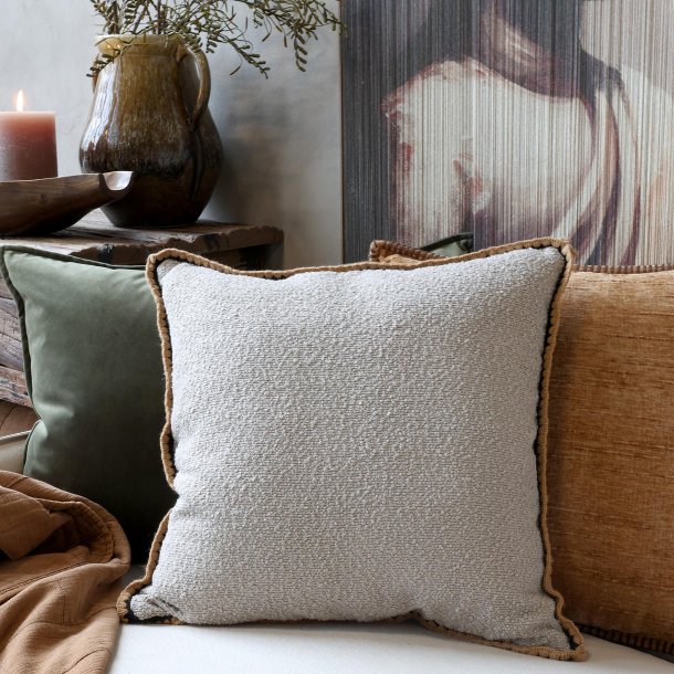 Pudebetr�k med h�klet kant p� sofa