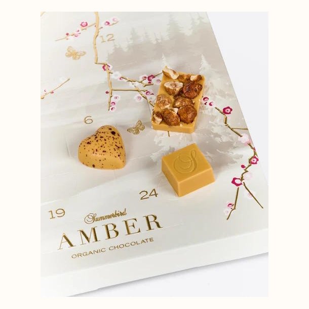 Amber-chokolade, fyldte stykker og dragerede hasseln�dder fra Summerbird julekalender