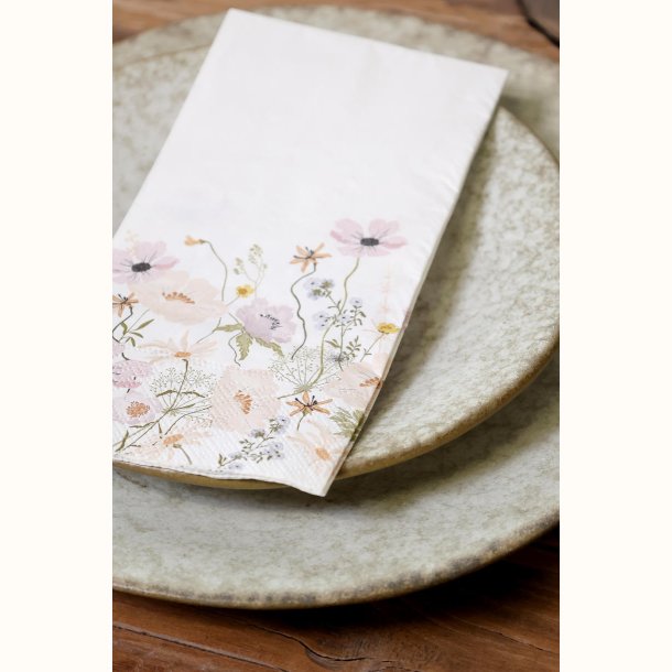 papirserviet med blomsterdetaljer close up af klassisk serviet design