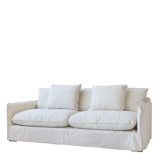 malo sofa i h�r med 5 puder i creme og latte