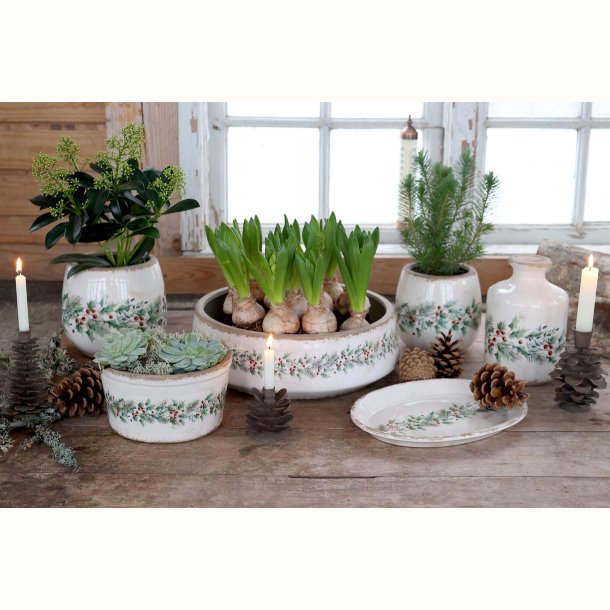 Koglelysestager ved potter og planter