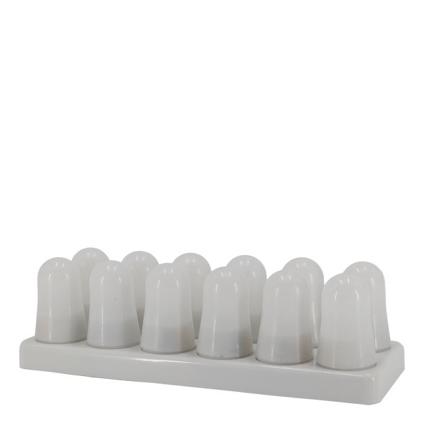 Genopladelige LED-fyrfadslys i opladerstation